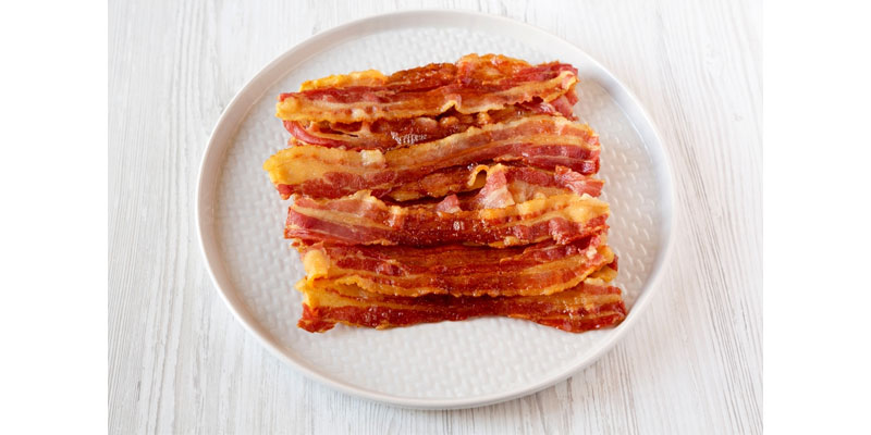 bacon slices on circular plate