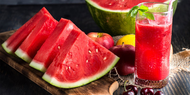 watermelon slices with glass of watermelon juice